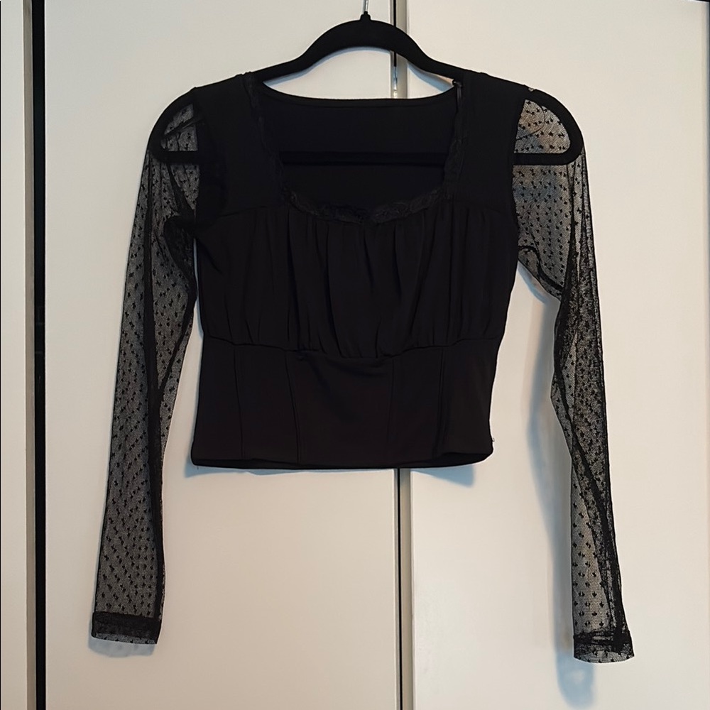 Sheer sleeve crop top with corset style panelling